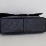 Chanel Black Caviar Single Flap Jumbo with Silver Hardware