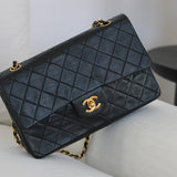 Vintage Chanel Black Lambskin Medium Classic Flap with 24k Gold Hardware