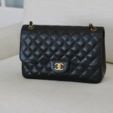 Chanel Black Caviar Double Flap Jumbo with Gold Hardware