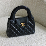 Chanel Black Calfskin Nano Kelly Top Handle with Aged Gold Hardware