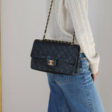 Vintage Chanel Black Lambskin Medium Classic Flap with 24k Gold Hardware