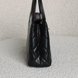 Chanel Black Calfskin Nano Kelly Top Handle with Aged Gold Hardware