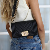 Chanel 20A Black Chevron Caviar Small Boy with Light Gold Hardware