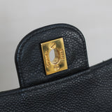 Vintage Chanel Black Caviar Vertical Flap with 24k Gold Hardware