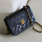 Vintage Chanel Black Lambskin Mini Circle Lock CC Flap with 24k Gold Hardware