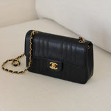 Vintage Chanel Black Caviar Vertical Flap with 24k Gold Hardware