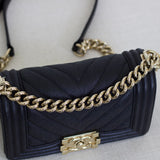 Chanel 20A Black Chevron Caviar Small Boy with Light Gold Hardware