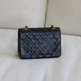 Vintage Chanel Black Lambskin Mini Circle Lock CC Flap with 24k Gold Hardware