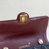 Vintage Chanel Black Lambskin Mini Circle Lock CC Flap with 24k Gold Hardware