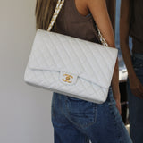 Chanel White Caviar Maxi Classic Flap with Gold Hardware