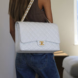 Chanel White Caviar Maxi Classic Flap with Gold Hardware