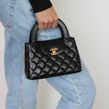 Chanel Black Calfskin Nano Kelly Top Handle with Aged Gold Hardware