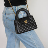 Chanel Black Calfskin Nano Kelly Top Handle with Aged Gold Hardware