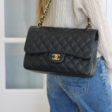 Chanel Black Caviar Double Flap Jumbo with Gold Hardware