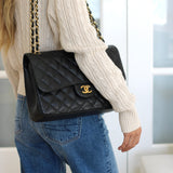 Chanel Black Caviar Double Flap Jumbo with Gold Hardware