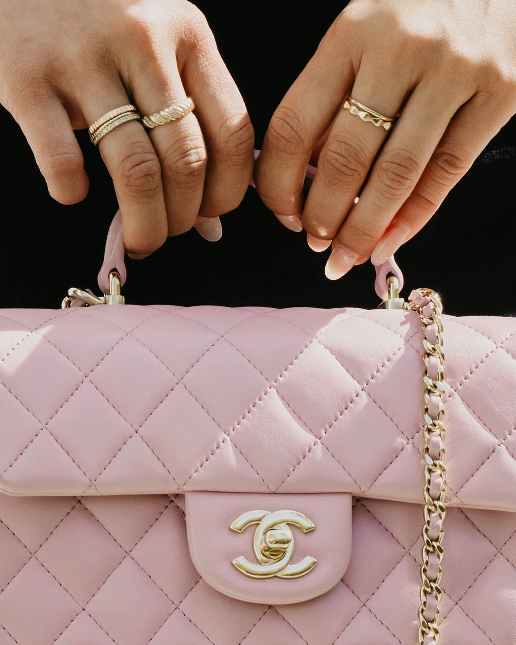 A light pink leather handbag by Chanel for Luxury Bag Consignment & Resale
